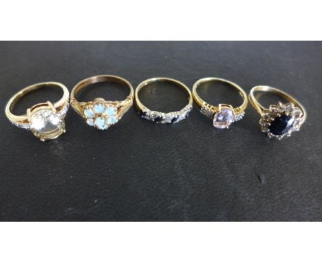 Five 9ct yellow gold dress rings - sizes Q, P, Q/R, N & O - total weight approx 12.1 grams