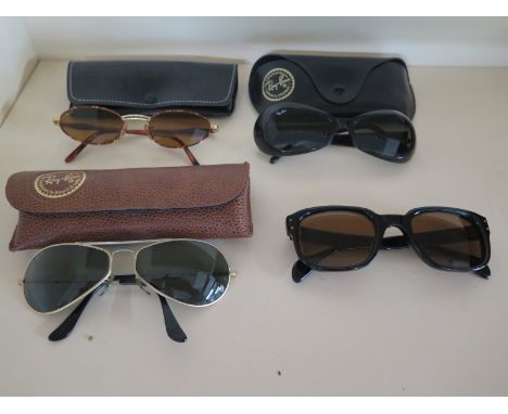 Three pairs of authentic vintage Ray-Ban sunglasses all with B&L, Bausch & Lomb engraved lenses, two pairs in Ray-Ban vintage