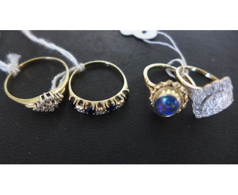 Four 9ct yellow gold dress rings - ring sizes X, R/S, P/Q, L/M - weight approx 9 grams