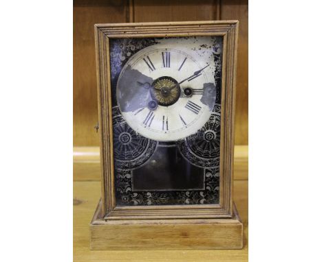 American pine cased mantel clock, the white painted dial with Roman numerals, 18cm wide x 26cm high