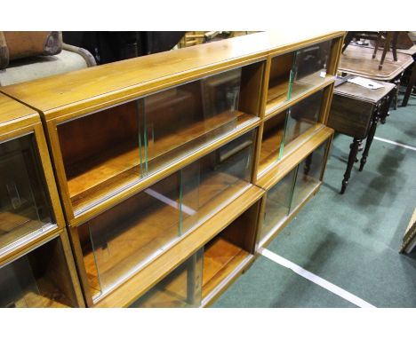 Pair of 20th Century Globe Wernicke style mahogany bookcases, the three-tier sections with glass sliding doors, 89cm high wid