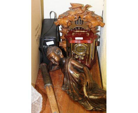 Acctim cuckoo clock, Hesmle anniversary clock, pair of |Tecnar 10x50 binoculars, Thai carved hardwood reclining figure (4)