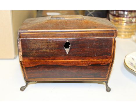 George III mahogany tea caddy, with lion mask handles, raised on claw and ball feet