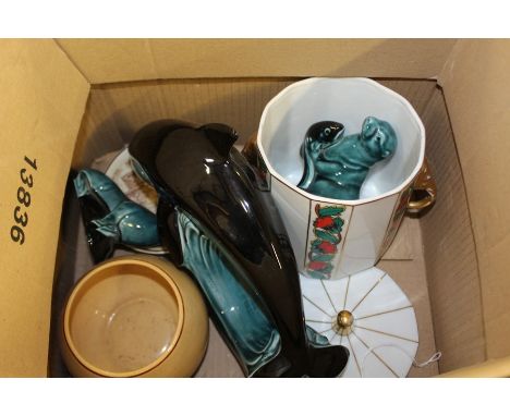 Porcelain, to include Poole pottery dolphin and two seals, together with Kandmalerei Geschutzt pot and cover, another pot and