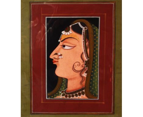 AN INDIAN PORTRAIT PAINTING OF KISHANGARH, mounted, overall 40cm x 35cm