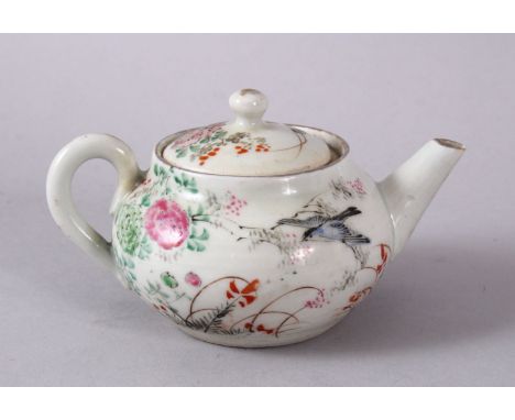 A SMALL CHINESE FAMILLE ROSE TEAPOT &amp; COVER, decorated with native scenes of flora and birds, the base unglazed, 6cm high