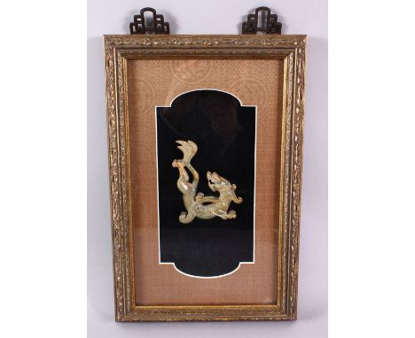 A GOOD CHINESE FRAMED CARVED JADE FIGURE OF A CHILONG, the archaic formed chilong within a box frame, with funghi border fram