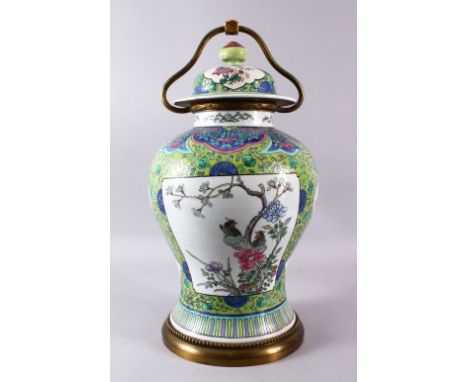 A CHINESE FAMILLE VERTE PORCELAIN VASE / LAMP, with panel decoration of birds in flora, green ground with floral decor, mount