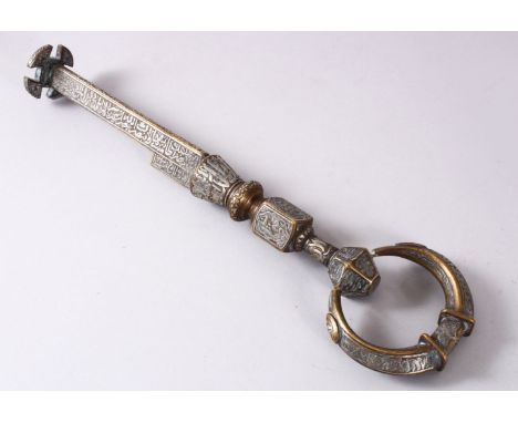 A FINE ISLAMIC MAMLUK OR OTTOMAN STYLE INLAID SILVER KAB'A KEY, the large heavy key inlaid with silver with bands of calligra