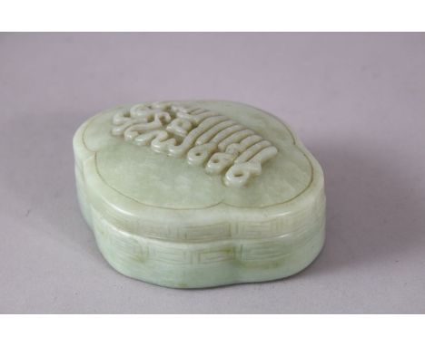 A RARE 19TH CENTURY CHINESE CARVED JADE BOX AND COVER for the Islamic market, of lobed form, the lid carved with calligraphy,