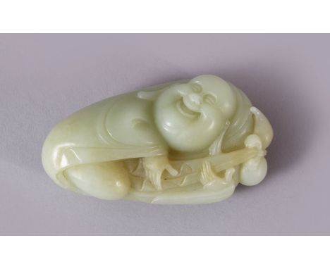 A CHINESE CARVED JADE FIGURE / PENDANT OF BUDDHA, in a recumbent position holding a tied double gourd, 9cm