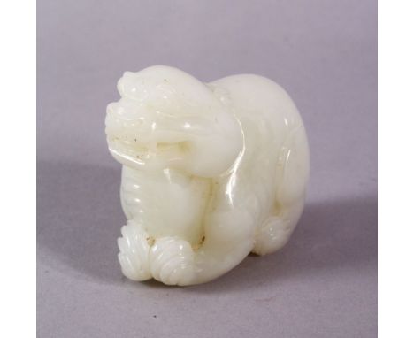 A WHITE JADE FIGURE OF A BEAST, 5cm long.
