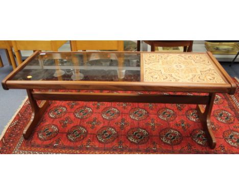 A 1970s teak coffee table, smoky glass and tile top design on trestle legs, 121 cm wide, 44 cm high, 50 cm deep approx 