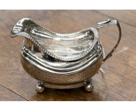 George III silver jug, boat form, marks part rubbed, probably London 1817