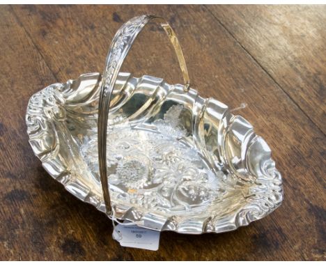 A Victorian silver oval cake basket, embossed with chrysanthemums, Henry Wilkinson & Co, London 1895, 16ozt