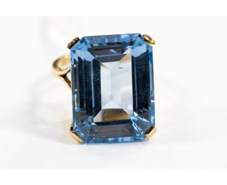 A topaz and 9ct yellow gold ring, the rectangular mixed cut topaz approximately 20 x 15mm, ring size K 1/2, gross weight appr