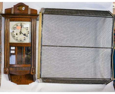 An early 20th Century mahogany drop cased wall clock; together with a Victorian dressing table mirror and a brass framed fire
