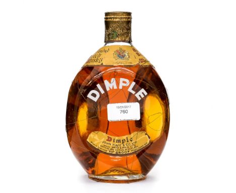 A bottle of Old Blended Haug Dimple Scotch Whisky, 1956 