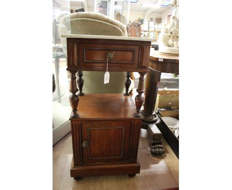 A late 19th Century mahogany marble topped pot cupboard, having a single drawer, shelf section and a single door to base