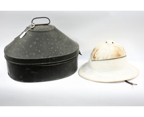 A cased (tin) pith helmet possibly from the 1930s India - owned by Eric Hudson Davies 1907-1989 who was Inspector of Schools 