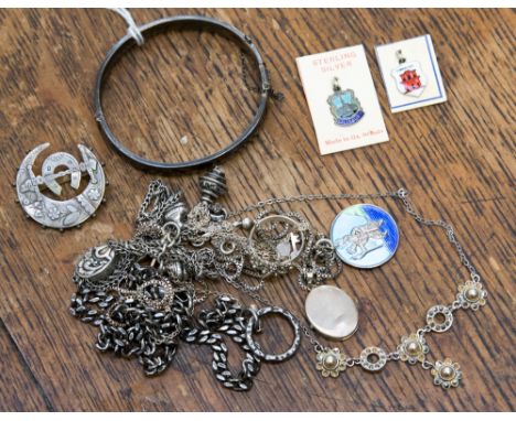 A quantity of silver jewellery 2.65 ozt/82 gms approx to include bangle, charms, brooches etc