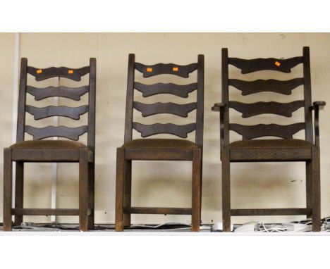 A part set of three ladder back chairs, comprising armchair and two side chairs, (3)