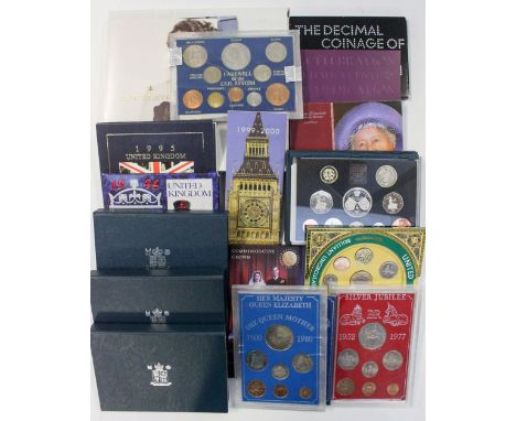 A collection of various coins in presentation packs various, silver etc... (18)