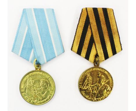 Soviet Restoration of Heavy Industry Medal and Soviet Medal for the Restoration of the Donets Basin Mines. (2)