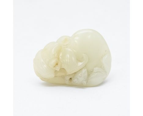 A Chinese carved jade pendant, modelled as a bat and rat on a gourd group, 3.5cm long