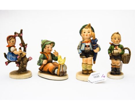 Four Hummel figures of children 