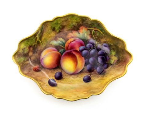 A Royal Worcester fruit painted pedestal fruit bowl, 1935, decorated with peaches, grapes and raspberries by T Lockyer, shall