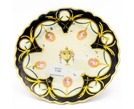 A Derby porcelain plate, circa 1775, the central polychrome urn with floral garland, surrounded by five portrait plaques susp