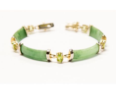 A silver gilt and jade bracelet, 14.2g