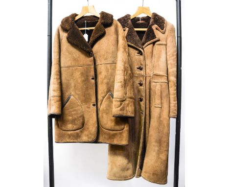 Two sheepskin coats, light tan, to include a 3/4 jacket size 14 with a dark sheepskin lining by Shearlings and a full length 