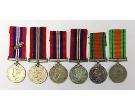 WW2 British Defence Medal: Defence Medal Canadian issue in silver: 1939-45 War Medal: War Medal with MiD Oakleaf: Canadian Si