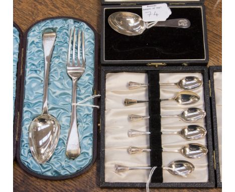 A cased set of six Art Deco silver egg spoons, Birmingham 1947, 1.26ozt; a George III silver spoon and fork set, cased, Londo