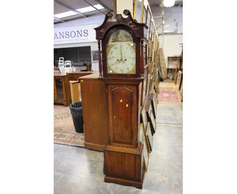 A George III oak and mahogany eight day longcase clock, white enamelled dial inscribed Pybus Castors  