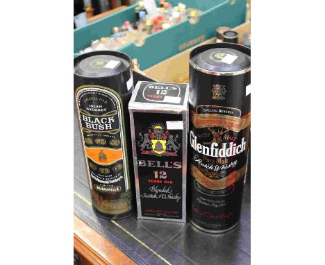 Bells 12 year old Scotch Whisky; together with one boxed Glenfiddich Malt Whisky and Bushmills Black Bush Irish Whiskey litre