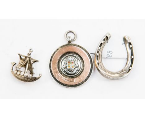 Silver horseshoe brooch, Birmingham, hallmark silver football medal, Scandinavian white metal Viking ship pendant (3)