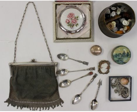 A 1920s silver coloured chain mail evening bag, five souvenir spoons, a Mackintoshs 'Beehive' toffee tin, circa 1900 containi