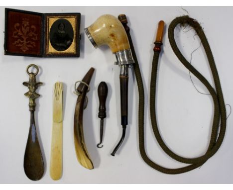 A collection of curios to include a Pipe with white metal fittings and extra flexible smoking tube, Bone page turner, cased p