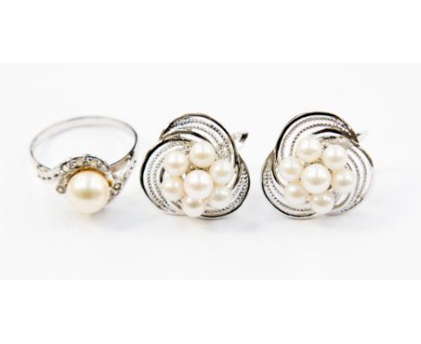 A white metal pearl ring, ring size R 1/2 and a pair of screw earrings