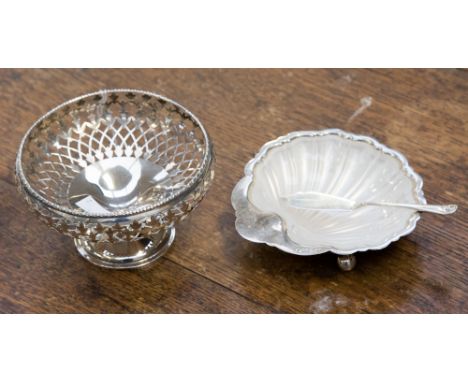 A George V silver circular pierced bowl, E S Barnsley & Co, Birmingham 1913, 3.12ozt; a George V silver shell-shape butter di