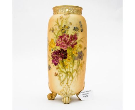 A Royal Worcester blush ivory spill vase, ovoid cylindrical form, on four scroll feet, decorated with flowers highlighted in 