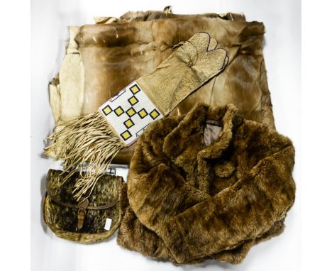A box of assorted textiles