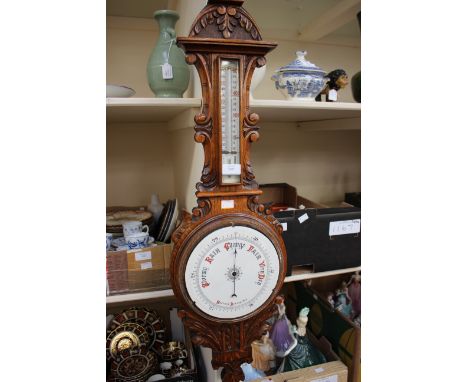 Victorian carved oak barometer