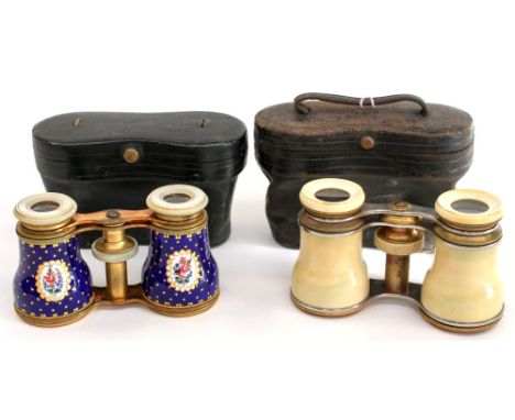 A pair of French enamelled, mother of pearl and brass opera glasses, blue and star ground enamel grips with jewelled cartouch