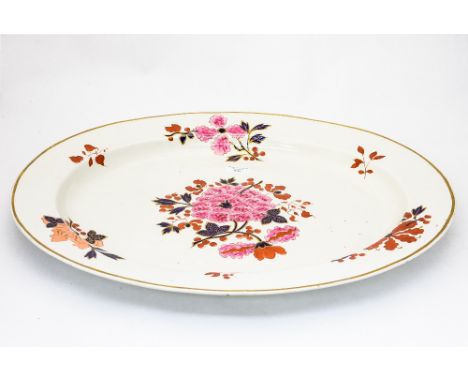 An early 19th Century Worcester Flight Barr and Barr meat platter, painted with a floral design in pink, blue, iron red and g