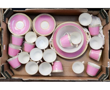 A late 19th/early 20th century tea set, comprising cups, saucers, slop bowl, plates, puce ground with gilt borders (1 box)