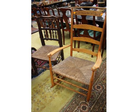 A late 19th / early 20th Century Shaker style ladder back rocking chair, probably birch, together with a 19th Century spindle